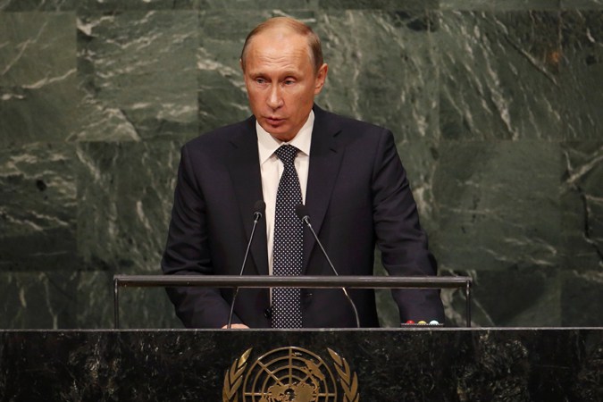 Russian President Vladimir Putin addresses attendees during the 70th session of the United Nations General Assembly at the U.N. Headquarters in New York