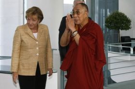 German Chancellor Merkel says goodbye to the Dalai Lama after their meeting at the chancellery in Berlin